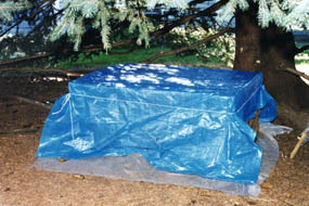 Enclosure Outside View With Tarp